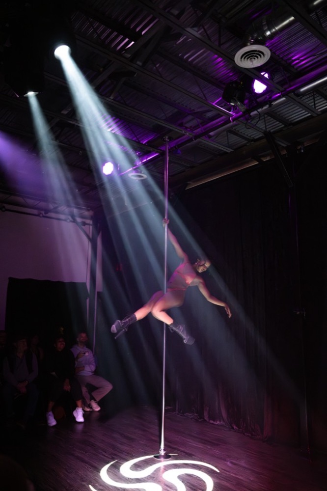 Pole dance artistry performance at Luna Aerial Dance & Performing Arts in Frederick, Maryland